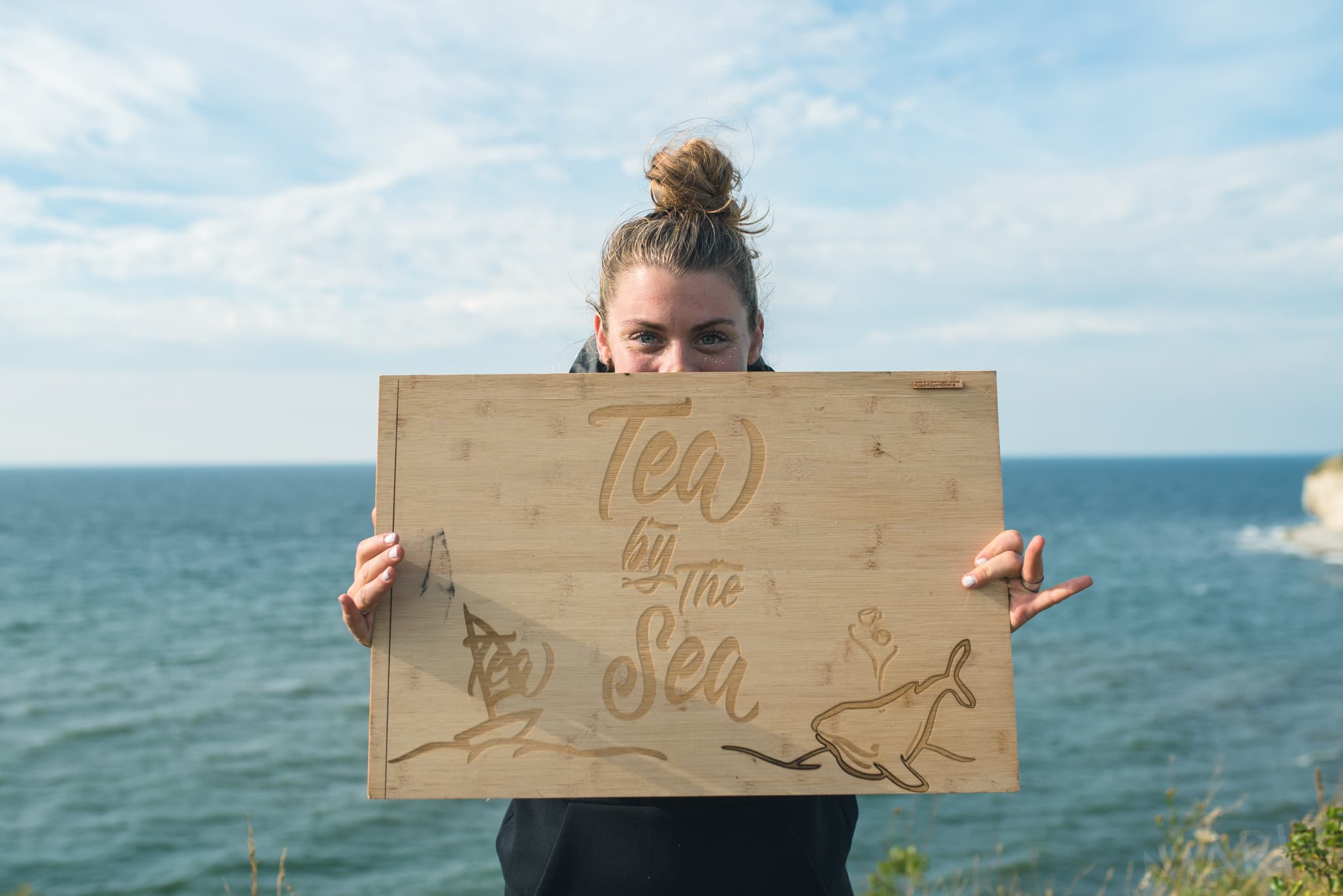 Tea by the Sea – our hand-crafted wooden sign by the Baltic Sea
